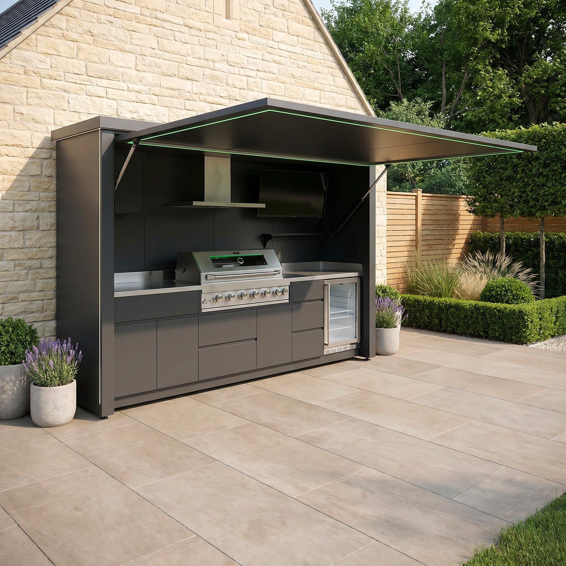 An outdoor kitchen cube open on a patio in daylight, the house behind it (supplier photograph)