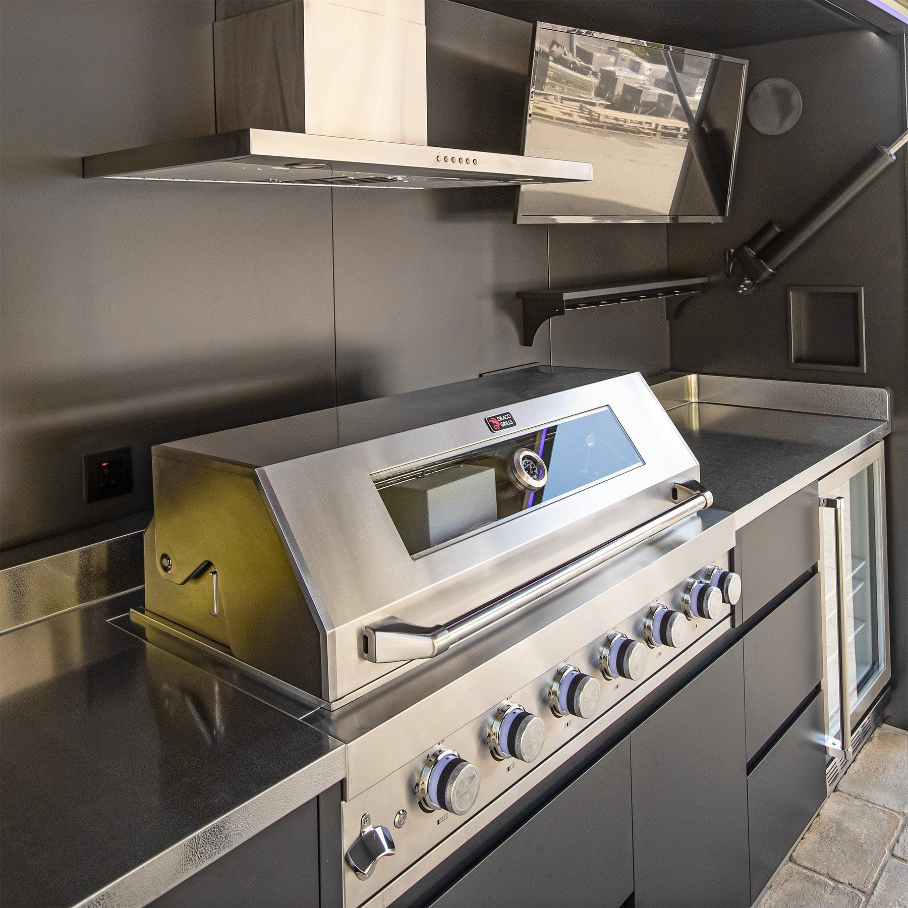The six burner grill and stainless worktop inside a cube, close in (supplier photograph)